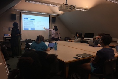 Faith teaching a HTML/CSS markup language for her computer science student organization